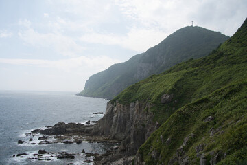 Dramatic Coastal Cliffs and Tower in Hakodate, Hokkaido
