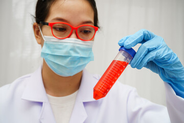 Scientist medical professional use test tube for research in science laboratory.