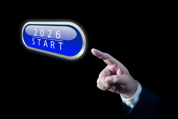 Businessman press blue illuminated start button year 2026, Start up business concept