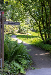 A wooden sign in a German park. Translation: "primitive"