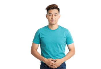 Young man wearing a turquoise T-shirt and jeans stands against a transparent background with hands clasped, short styled hair and a neutral expression, photographed in a clean studio portrait