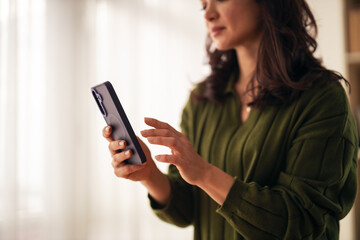 Woman using smartphone for communication and lifestyle