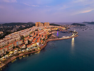 Obraz premium Aerial View of Sunset Town and Kiss Bridge in Phu Quoc at Twilight