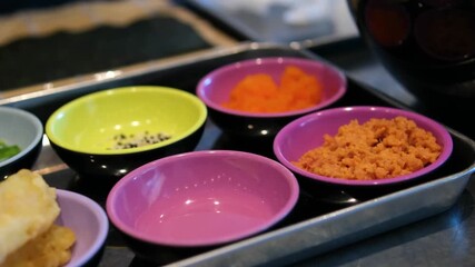 sushi preparation process Sushi chef, preparation and hands roll fish in restaurant. Kitchen, culinary artist and gourmet tuna ingredients for seafood snack, nutrition and meal