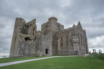 The ruin of Rock of Cashel in County Tipperary, Ireland with an overcast sky
