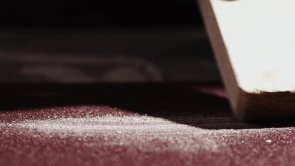 Extreme close-up of sandpaper for wood processing of materials in carpentry workshop