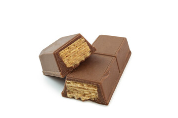 Broken chocolate wafer bars isolated on white background. Delicious crispy wafer with milk chocolate coating and creamy layers. Sweet snack or dessert pieces for confectionery concept.