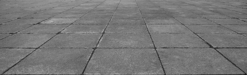 empty stone floor top in perspective. grey tile floor background in perspective view. line. empty copy space stone street. pavement. Granite outdoor tiled floor. gray granite. Marble texture
