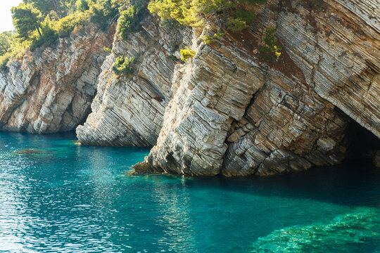 Rocky coastline with turquoise sea in Petrovac, Montenegro