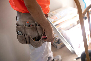 construction worker with tool belts