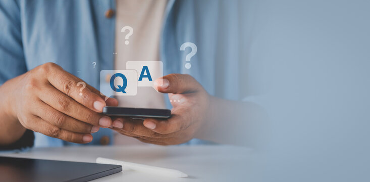 International ask a question day concept, Businessman hand clicking Q&A or Question and Answer button FAQ( frequency asked questions), question mark, Answer, Q and A, Communication and Brainstorming