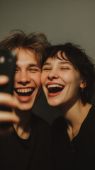 couple taking playful photos of each other on a phone