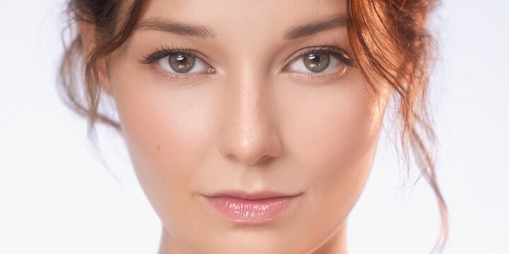 Natural Beauty Portrait of Woman With Clean Skin and Soft Expression