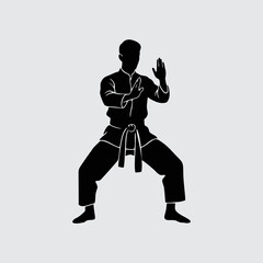Martial Arts Master in Fighting Stance Silhouette Isolated on White Background