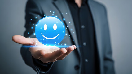 Holographic smiley face projection in businessman's hand futuristic technology concept