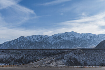 Railway embankment in the Issyk-Kul region of Kyrgyzstan. Railroad travel.