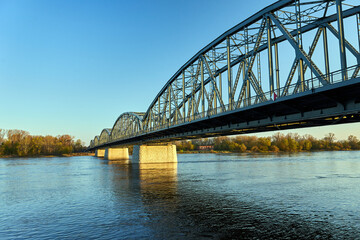 The Vistula River and the steel structure of a road bridge in Torun