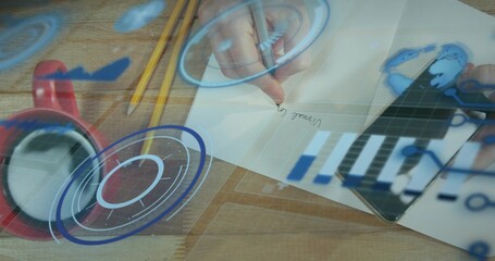 Writing adult hands holding pen tapping tablet at desk light shirt cuff paper pencils mug HUD