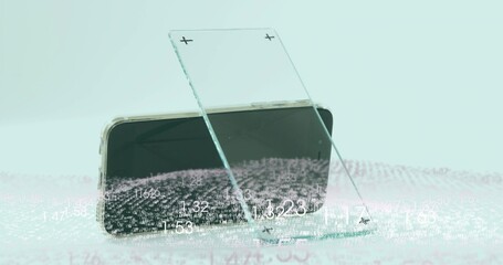 Displaying smartphone with black screen and clear case on mint mat, acrylic panels and data overlay