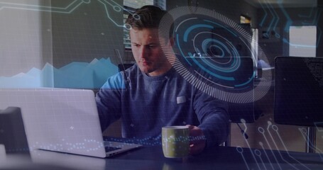 Working man wearing dark blue sweater studying code on laptop at office, holding green mug, HUD