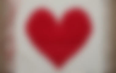 Blurred red heart shape behind textured glass. A romantic and emotional abstract background.