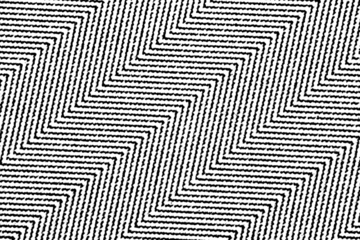 Black zigzag lines with a rough grunge texture forming a repeating pattern on a transparent background.