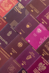 Fototapeta premium Passports of citizens of different countries of the world. Passports background