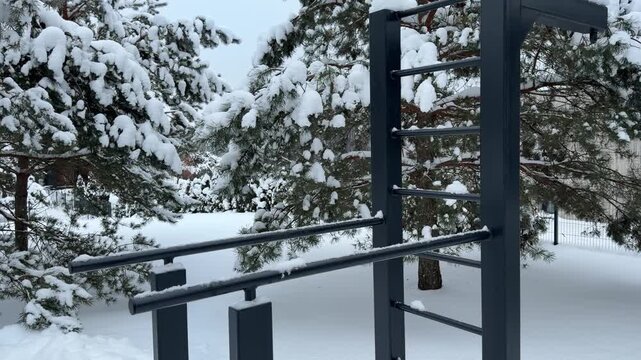 Close Up of Outdoor Fitness Equipment in Snowy Park