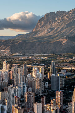 benidorm spain mediterranean skyline cityscape with mountains and valley in daylight showing urban density of highrise resorts across the hills