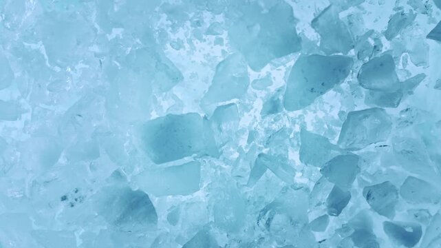 Super Slow Motion of Exploding Ice Shards . Filmed on High Speed Cinema Camera at 1000 FPS