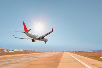 A passenger plane taking off airport - Tire tracks of airplane tires left marks on the runway 
