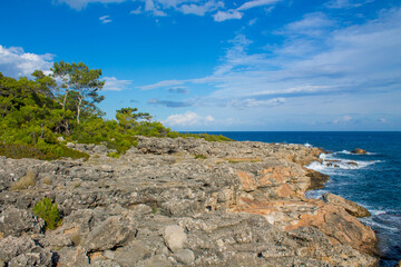 Turkey seaside picturesque landscape with blue water bays, mountains and forest. Turkish nature at the seaside along the Likya yolu Lycian way hiking trail landscape by the sea and beautiful bay