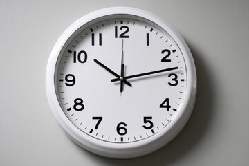 Classic Wall Clock Displaying Time in a Quiet Midday Office Environment