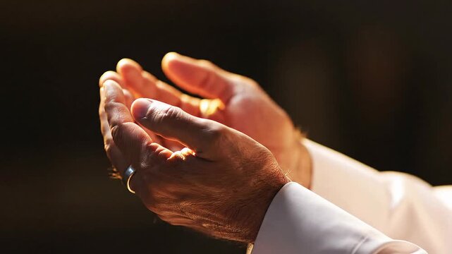 Close Up Hands Cupped in Dua Supplication Prayer