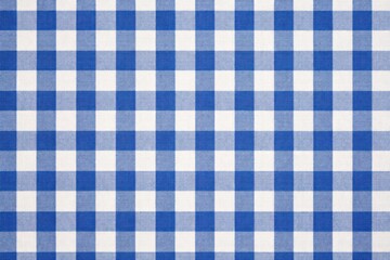 A vibrant blue and white checkered pattern, featuring alternating squares that create a classic textile design, often used in home decor and dining settings.