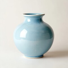 Light blue ceramic vase with rounded shape and crackle glaze
