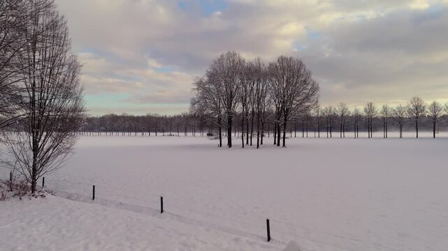 Long Drone Flight Over Snowy Fields