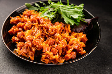 Stewed cabbage with ham cube tomato sauce braised cabbage vegetable healthy food main course ingredient appetizer fresh tasty table setting gourmet food background on the table rustic food  