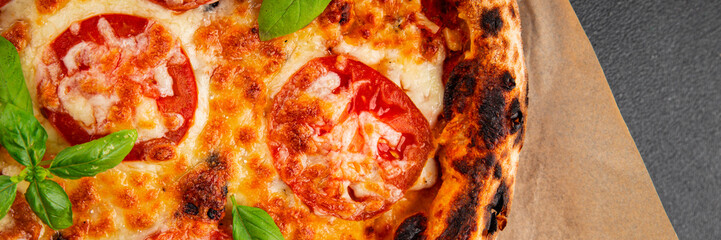 Pizza tomato margarita fast food natural product tasty snack fresh delicious gourmet food background on the table rustic top view copy space