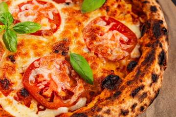 Pizza tomato margarita fast food natural product tasty snack fresh delicious gourmet food background on the table rustic top view copy space