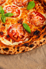 Pizza tomato margarita fast food natural product tasty snack fresh delicious gourmet food background on the table rustic top view copy space