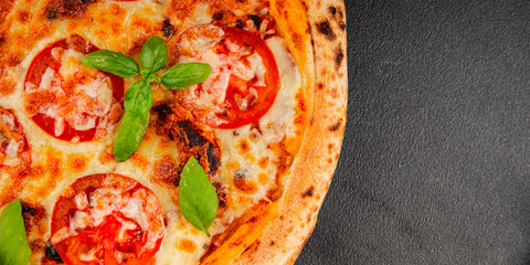 Pizza tomato margarita fast food natural product tasty snack fresh delicious gourmet food background on the table rustic top view copy space