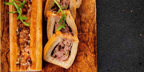 pate en crout in pastry natural baking healthy food main course ingredient appetizer fresh tasty table setting gourmet food background on the table rustic food top view copy space