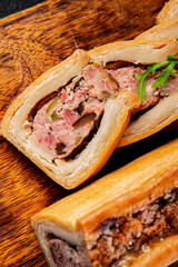 pate en crout in pastry natural baking healthy food main course ingredient appetizer fresh tasty table setting gourmet food background on the table rustic food top view copy space