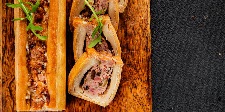 pate en crout in pastry natural baking healthy food main course ingredient appetizer fresh tasty table setting gourmet food background on the table rustic food top view copy space