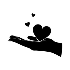 Hand gently holding a heart symbol, representing love, care, and kindness