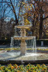 Small ornamental stone fountain in Retiro Park in Madrid, Spain