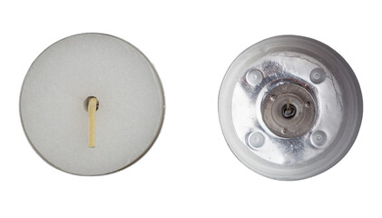 A round tealight candle paired with a metallic base new and burnt out isolated on a white background