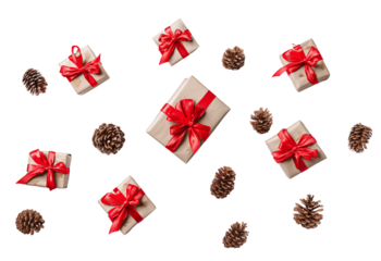 Christmas gifts wrapped in brown paper with red ribbons and pine cones scattered isolated on a transparent background