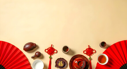 Traditional Chinese tea ceremony setup with red fans and decorations